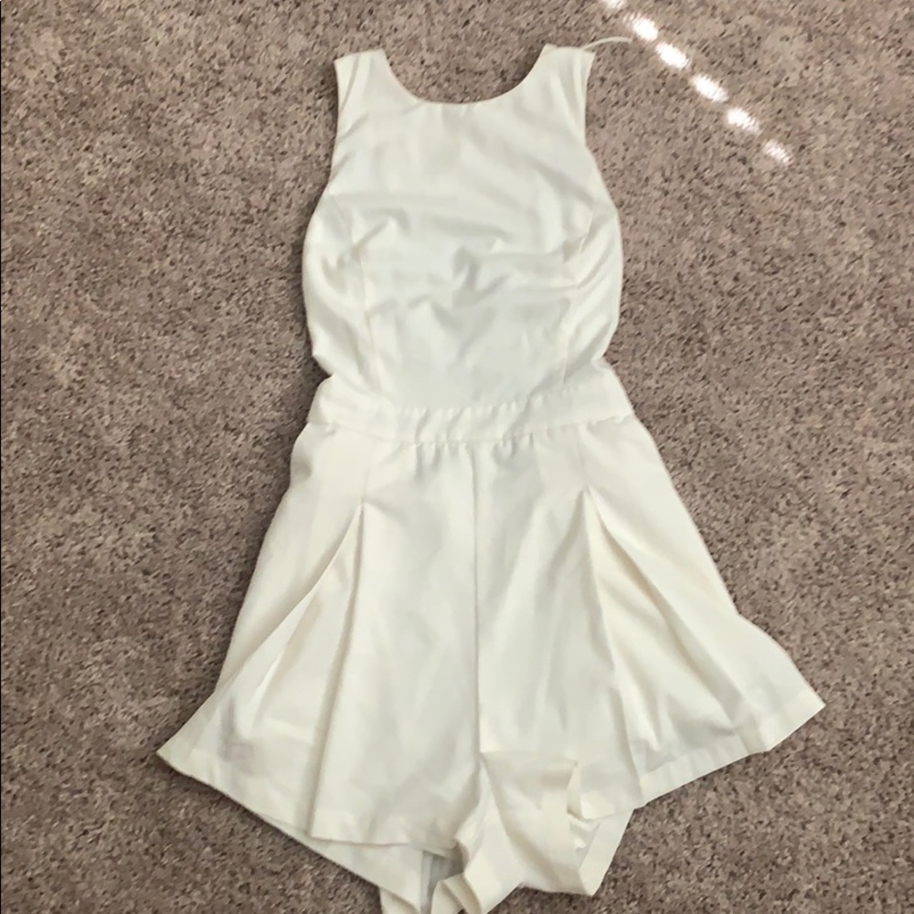 White romper with super cute back!